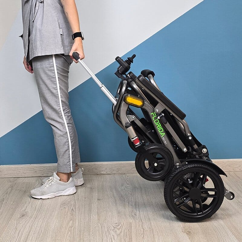 silla eléctrica plegable tipo maleta